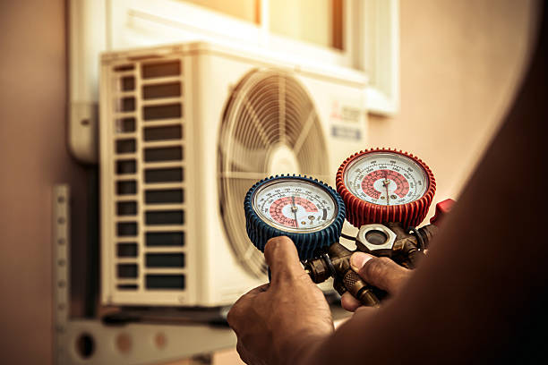 Professional Heat Pump Repair technician working in Metamora, MI